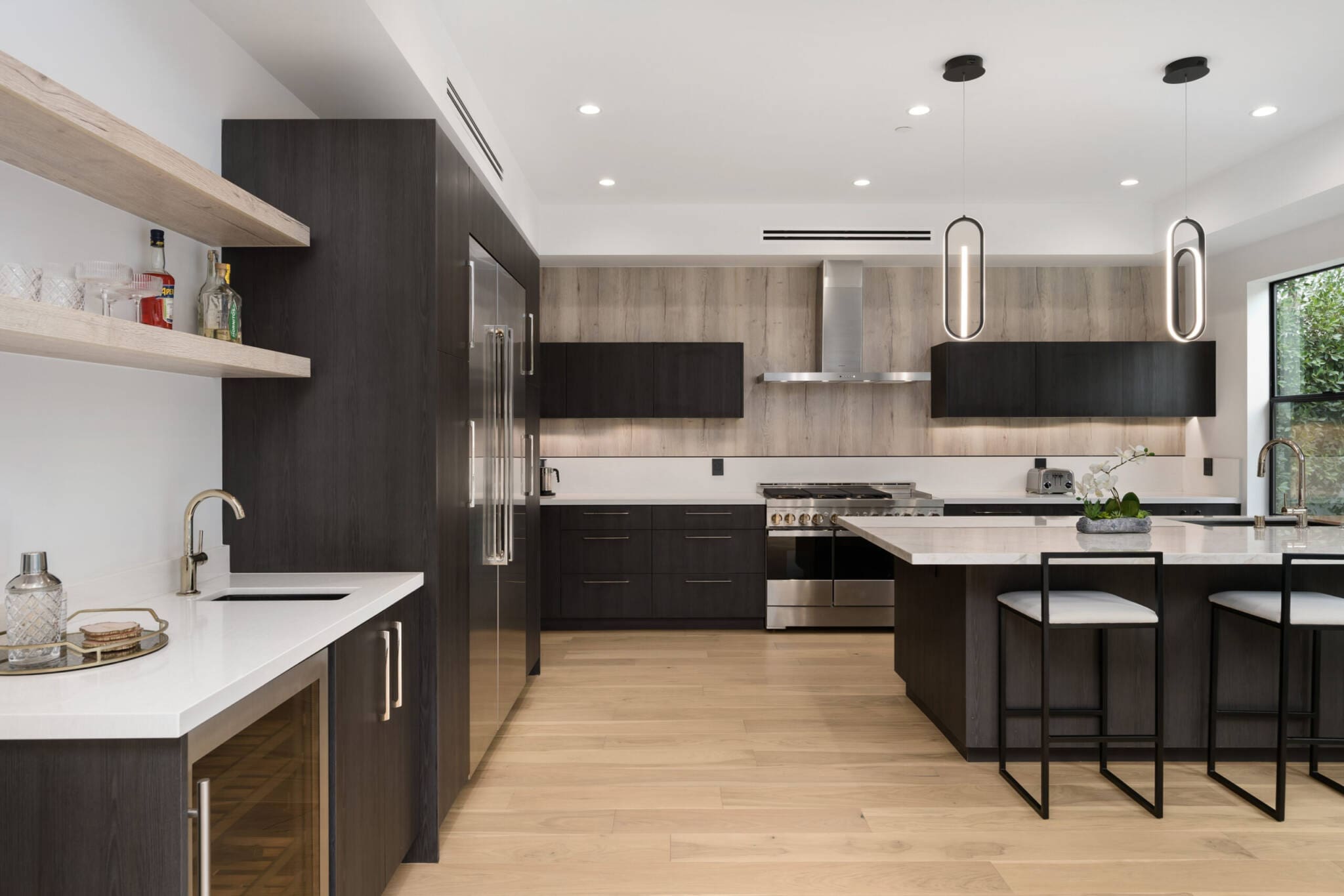 An Open Kitchen That Has Two Bar Stools By It 2025 02 10 06 14 22 Utc Scaled 1 Scaled