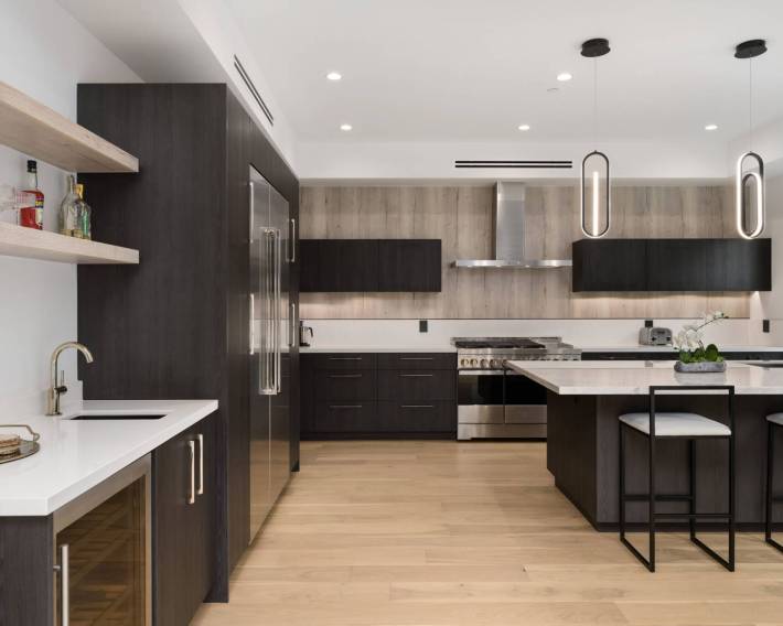 An Open Kitchen That Has Two Bar Stools By It 2025 02 10 06 14 22 Utc Scaled 1 Scaled